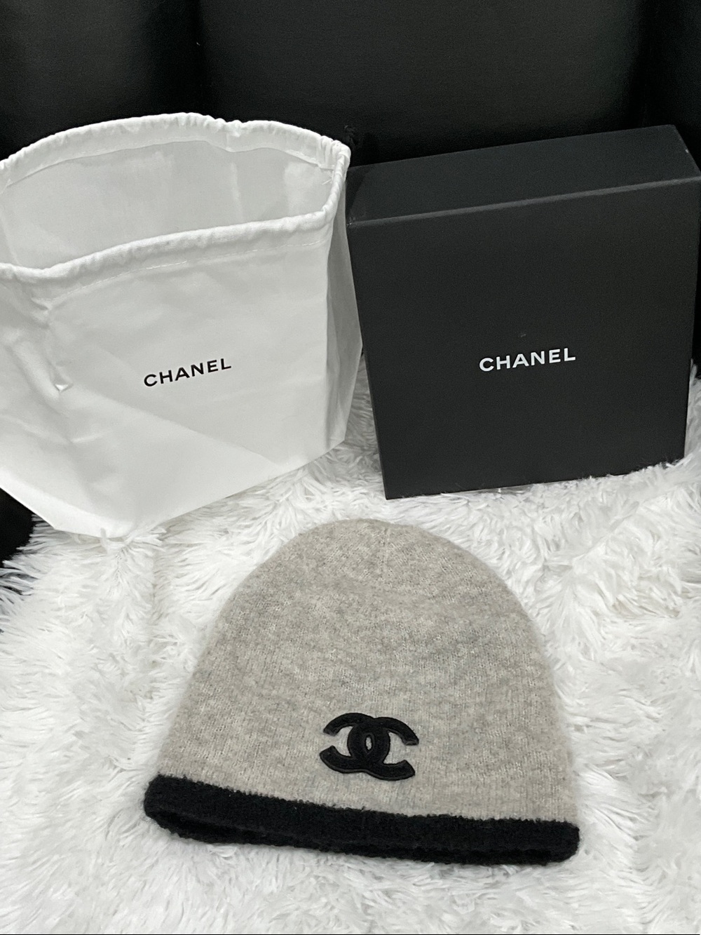 CHANEL Gray Beanie with Black Trim and CC Logo